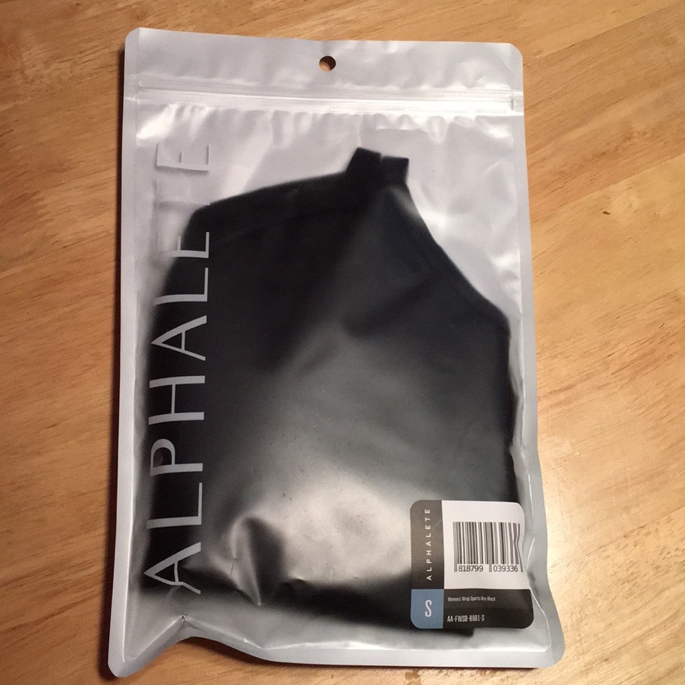 New, black wrap around sports bra